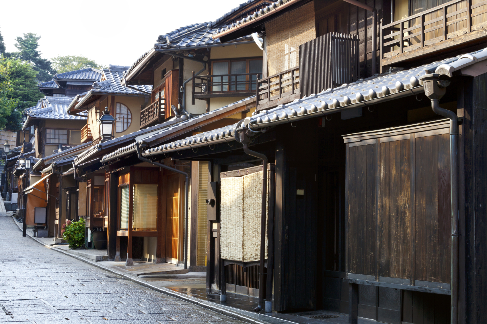 Street of old wooden houses in historic Kyoto Japan