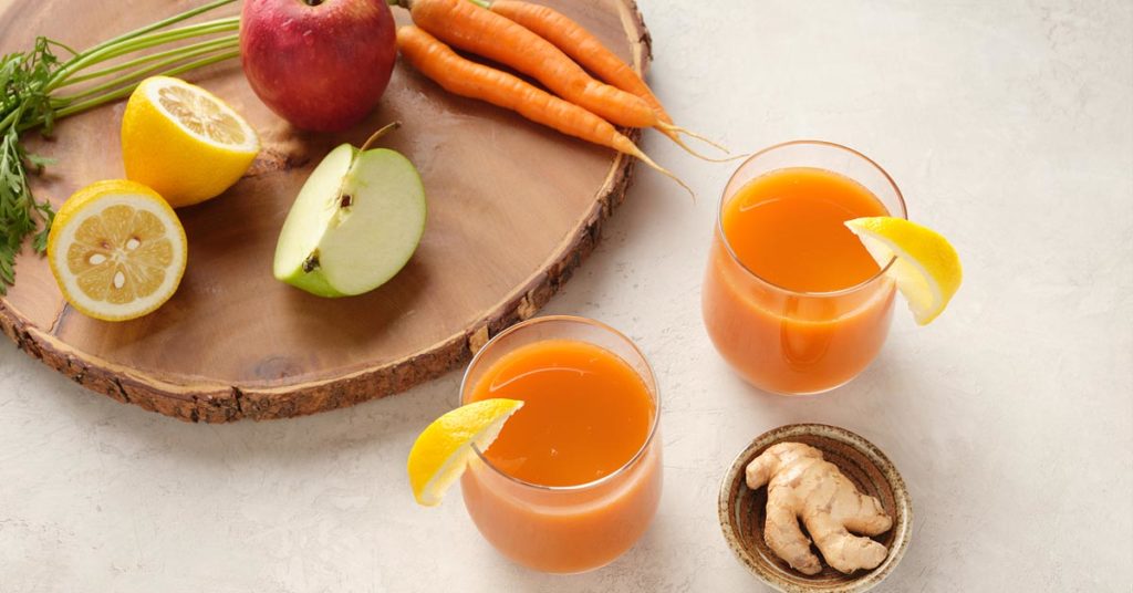 carrot-juice-recipe-apple-ginger-hero-1024x536